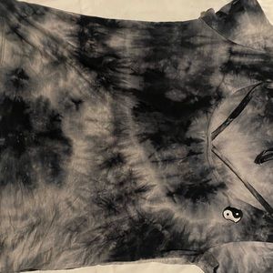 X-small T-shirt , fits small. Yin and Yang symbol on the front